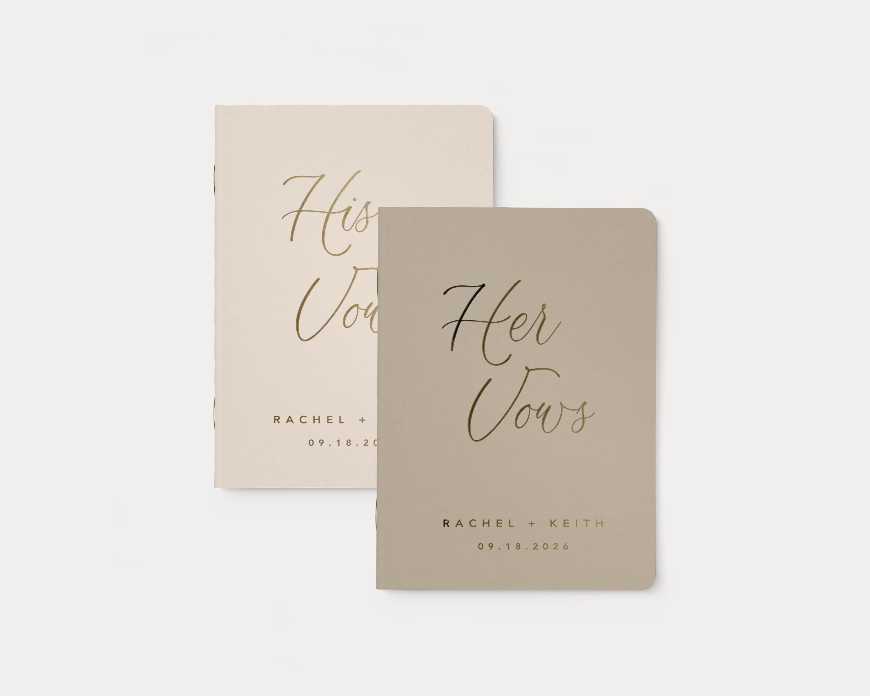 Luxury personalized vow book pair with gold foil text.