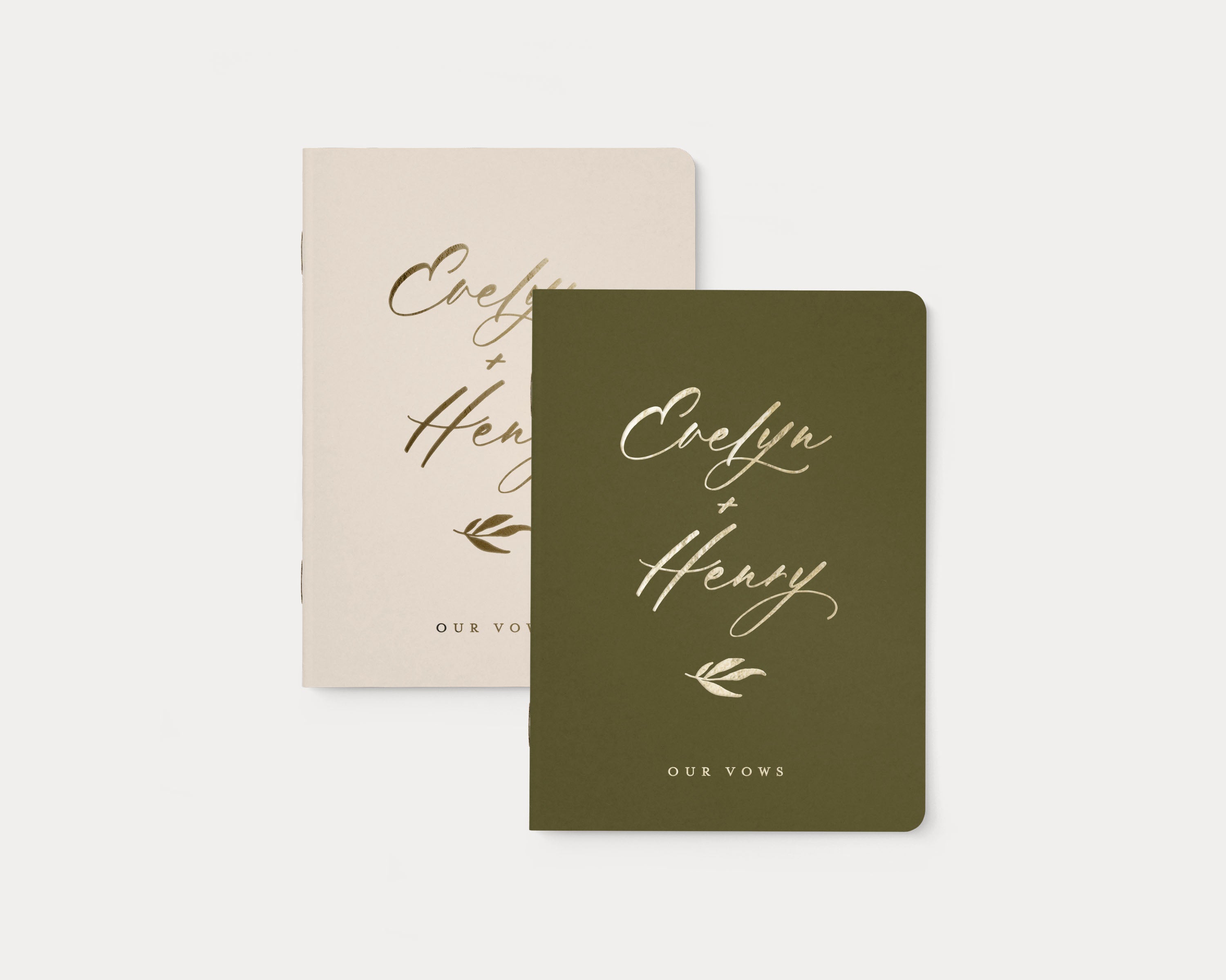 Luxury personalized vow book pair with gold foil text.